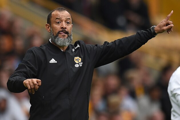 Wolverhampton Wanderers' Portuguese head coach Nuno Espirito Santo gestures on the touchline during the English Premier League football match between Wolverhampton Wanderers and Burnley at the Molineux stadium in Wolverhampton, central England on September 16, 2018. - Wolves won the game 1-0. (Photo by Oli SCARFF / AFP) / RESTRICTED TO EDITORIAL USE. No use with unauthorized audio, video, data, fixture lists, club/league logos or 'live' services. Online in-match use limited to 120 images. An additional 40 images may be used in extra time. No video emulation. Social media in-match use limited to 120 images. An additional 40 images may be used in extra time. No use in betting publications, games or single club/league/player publications. /         (Photo credit should read OLI SCARFF/AFP/Getty Images)