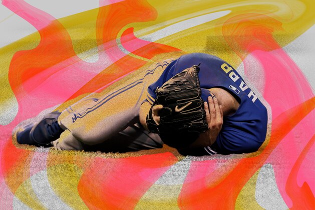 Arizona Diamondbacks starting pitcher Robbie Ray falls to the ground after being hit in the head by a line drive back to the mound by St. Louis Cardinals' Luke Voit during the second inning of a baseball game Friday, July 28, 2017, in St. Louis. Ray left the game. (AP Photo/Jeff Roberson)