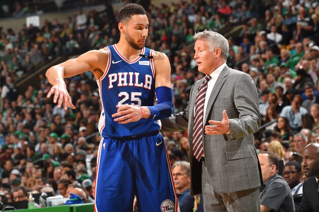 BOSTON, MA - MAY 9: Ben Simmons #25 and Head Coach Brett Brown of the Philadelphia 76ers talk during the game against the Boston Celtics during Game Five of the Eastern Conference Semifinals of the 2018 NBA Playoffs on May 9, 2018 at the TD Garden in Boston, Massachusetts. NOTE TO USER: User expressly acknowledges and agrees that, by downloading and or using this photograph, User is consenting to the terms and conditions of the Getty Images License Agreement. Mandatory Copyright Notice: Copyright 2018 NBAE (Photo by Jesse D. Garrabrant/NBAE via Getty Images)