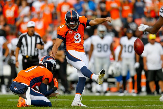 DENVER, CO - SEPTEMBER 16:  Kicker Brandon McManus #8 of the Denver Broncos kicks a game-winning field goal to put the Denver Broncos ahead 20-19 in the fourth quarter of a game against the Oakland Raiders at Broncos Stadium at Mile High on September 16, 2018 in Denver, Colorado. Punter Marquette King #1 is pictured holding.  (Photo by Justin Edmonds/Getty Images)