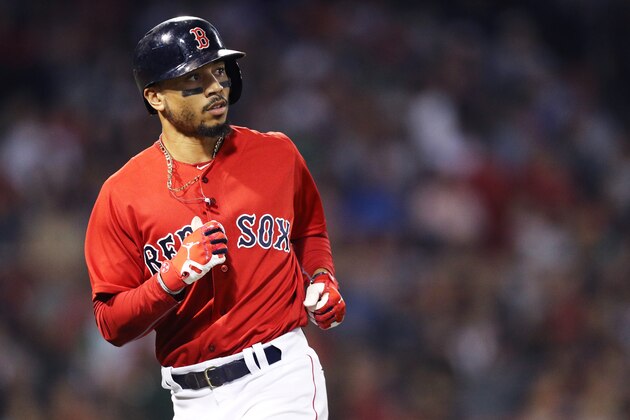 BOSTON, MA - SEPTEMBER 14: Mookie Betts #50 of the Boston Red Sox looks on during the third inning against the New York Mets at Fenway Park on September 14, 2018 in Boston, Massachusetts.(Photo by Maddie Meyer/Getty Images)