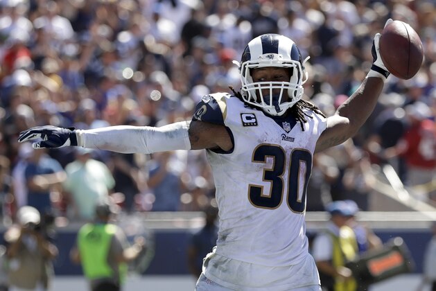 Los Angeles Rams running back Todd Gurley celebrates after scoring during the first half of an NFL football game against the Arizona Cardinals Sunday, Sept. 16, 2018, in Los Angeles. (AP Photo/Marcio Jose Sanchez)