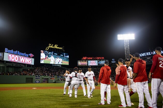 BOSTON, MA - SEPTEMBER 12: Members of the Boston Red Sox celebrate a victory against the Toronto Blue Jays on September 12, 2018 at Fenway Park in Boston, Massachusetts. It was their 100th win of the season. (Photo by Billie Weiss/Boston Red Sox/Getty Images)