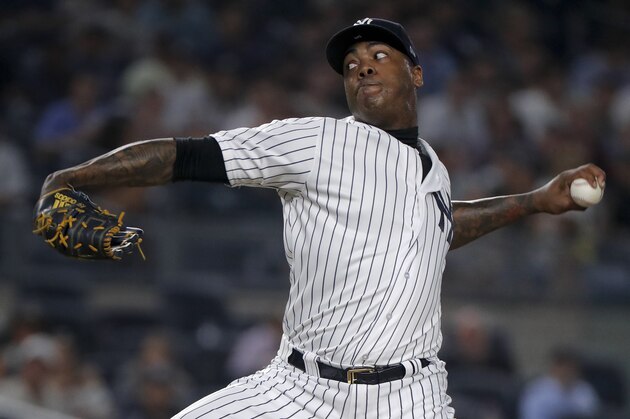 New York Yankees relief pitcher Aroldis Chapman delivers against the Texas Rangers during the ninth inning of a baseball game, Thursday, Aug. 9, 2018, in New York. (AP Photo/Julie Jacobson)