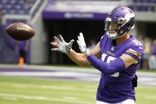 Minnesota Vikings wide receiver Adam Thielen catches a pass during warmups before an NFL preseason football game against the Jacksonville Jaguars, Saturday, Aug. 18, 2018, in Minneapolis. (AP Photo/Bruce Kluckhohn)