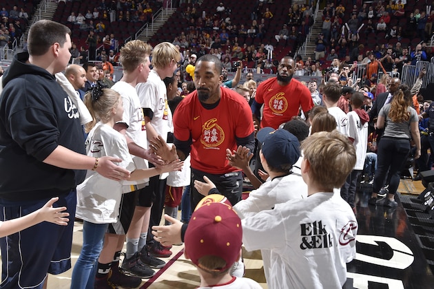 CLEVELAND, OH - FEBRUARY 27:  JR Smith #5 of the Cleveland Cavaliers high fives young fans before the game against the Brooklyn Nets on February 27, 2018 at Quicken Loans Arena in Cleveland, Ohio. NOTE TO USER: User expressly acknowledges and agrees that, by downloading and/or using this Photograph, user is consenting to the terms and conditions of the Getty Images License Agreement. Mandatory Copyright Notice: Copyright 2018 NBAE  (Photo by David Liam Kyle/NBAE via Getty Images)