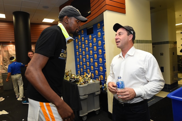 OAKLAND, CA - JUNE 12:  Joe Lacob and Kevin Durant #35 of the Golden State Warriors after winning the NBA Championshiop against the Cleveland Cavaliers in Game Five of the 2017 NBA Finals on June 12, 2017 at ORACLE Arena in Oakland, California. NOTE TO USER: User expressly acknowledges and agrees that, by downloading and/or using this photograph, user is consenting to the terms and conditions of Getty Images License Agreement. Mandatory Copyright Notice: Copyright 2017 NBAE (Photo by Andrew D. Bernstein/NBAE via Getty Images)