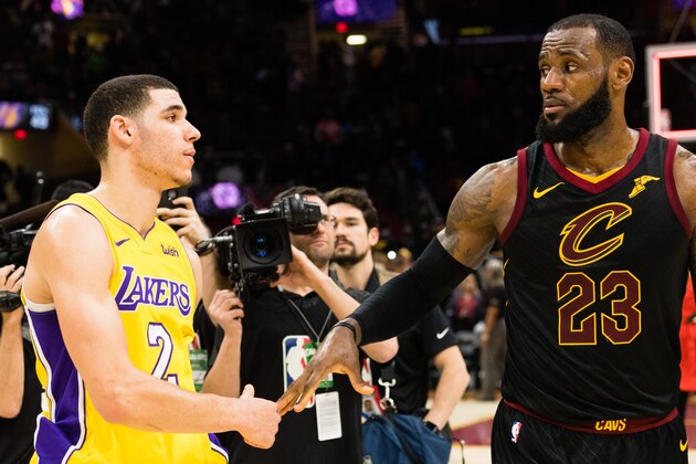 CLEVELAND, OH - DECEMBER 14: Lonzo Ball #2 of the Los Angeles Lakers shakes hands with LeBron James #23 of the Cleveland Cavaliers after the game at Quicken Loans Arena on December 14, 2017 in Cleveland, Ohio. The Cavaliers defeated the Lakers 121-112. NOTE TO USER: User expressly acknowledges and agrees that, by downloading and or using this photograph, User is consenting to the terms and conditions of the Getty Images License Agreement. (Photo by Jason Miller/Getty Images)