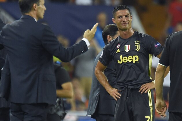 Juventus' Portuguese forward Cristiano Ronaldo reacts after receiving a red card during the UEFA Champions League group H football match between Valencia CF and Juventus FC at the Mestalla stadium in Valencia on September 19, 2018. (Photo by JOSE JORDAN / AFP)        (Photo credit should read JOSE JORDAN/AFP/Getty Images)