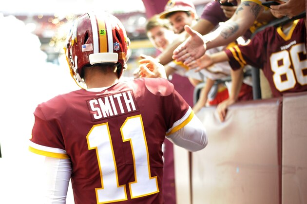 Washington Redskins quarterback Alex Smith walks out of the tunnel prior to an NFL football game against the Indianapolis Colts, Sunday, Sept. 16, 2018, in Landover, Md. (AP Photo/Mark Tenally)