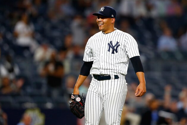 NEW YORK, NY - SEPTEMBER 19:  Justus Sheffield #61 of the New York Yankees in his MLB debut celebrates after getting Mookie Betts #50 of the Boston Red Sox to ground into a double play to end the game in the ninth inning at Yankee Stadium on September 19, 2018 in the Bronx borough of New York City. New York Yankees defeated the Boston Red Sox 10-1. (Photo by Mike Stobe/Getty Images)