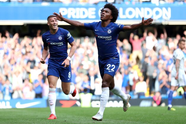 LONDON, ENGLAND - SEPTEMBER 15:  Willian of Chelsea celebrates after scoring his team's fourth goal during the Premier League match between Chelsea FC and Cardiff City at Stamford Bridge on September 15, 2018 in London, United Kingdom.  (Photo by Dan Istitene/Getty Images)
