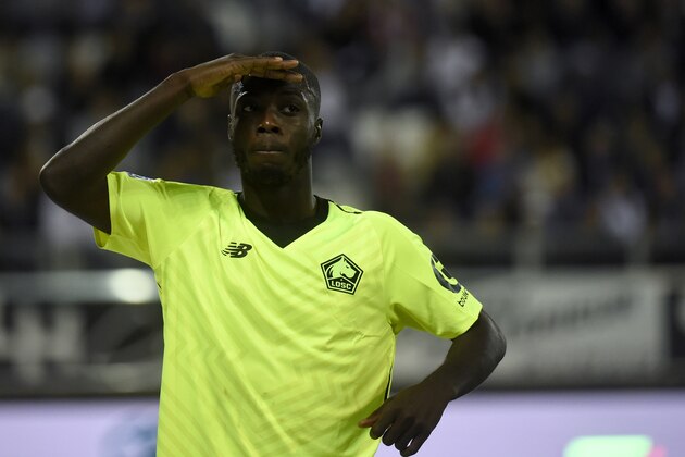 Lille's Ivorian forward Nicolas Pepe celebrates after scoring a goal during the French L1 football match between Amiens and Lille at the Licorne stadium in Amiens, northern France, on August 26, 2018. (Photo by FRANCOIS LO PRESTI / AFP)        (Photo credit should read FRANCOIS LO PRESTI/AFP/Getty Images)