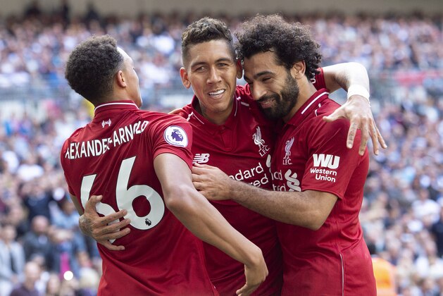 LONDON, ENGLAND - SEPTEMBER 15: Roberto Firmino of Liverpool celebrates his goal with Trent Alexander-Arnold and Mohamed Salah during the Premier League match between Tottenham Hotspur and Liverpool FC at Wembley Stadium on September 15, 2018 in London, United Kingdom. (Photo by Visionhaus/Getty Images) LONDON, ENGLAND - SEPTEMBER 15: Roberto Firmino of Liverpool celebrates his goal with Trent Alexander-Arnold and Mohamed Salah during the Premier League match between Tottenham Hotspur and Liverpool FC at Wembley Stadium on September 15, 2018 in London, United Kingdom. (Photo by Visionhaus/Getty Images)