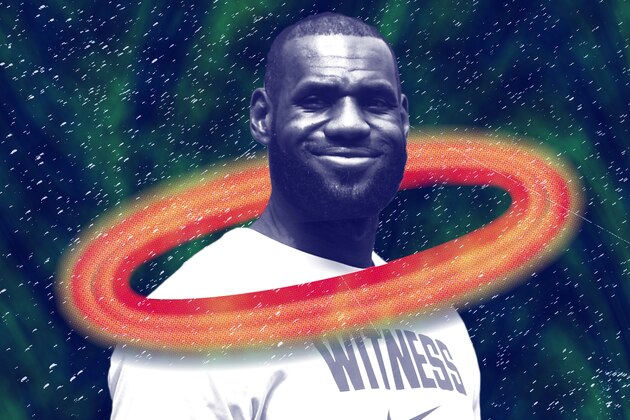Cleveland Cavaliers basketball player LeBron James talks to reporters as he arrives  for the special screening of his film,
