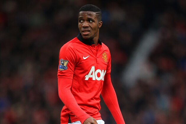 MANCHESTER, ENGLAND - DECEMBER 07:  Wilfried Zaha of Manchester United in action during the Barclays Premier League match between Manchester United and Newcastle United at Old Trafford on December 7, 2013 in Manchester, England.  (Photo by Richard Heathcote/Getty Images)