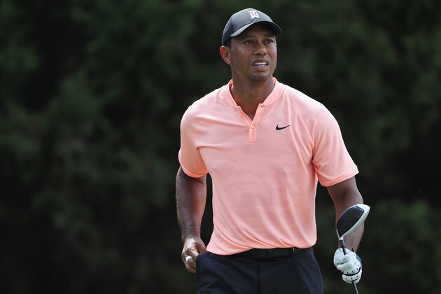 ATLANTA, GA - SEPTEMBER 20:  Tiger Woods of the United States reacts to his shot from the eighth tee during the first round of the TOUR Championship at East Lake Golf Club on September 20, 2018 in Atlanta, Georgia.  (Photo by Sam Greenwood/Getty Images)