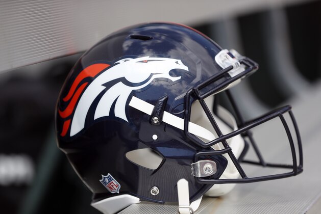 A Denver Broncos helmet sits on the bench prior to an NFL football game against the Oakland Raiders, Sunday, Sept. 16, 2018, in Denver. (AP Photo/Jack Dempsey)