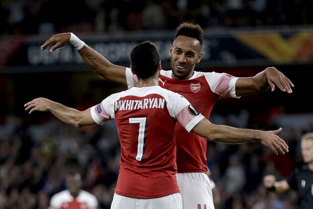 LONDON, ENGLAND - SEPTEMBER 20:  Pierre-Emerick Aubameyang of Arsenal celebrates after scoring his team's third goal with Henrikh Mkhitaryan of Arsenal during the UEFA Europa League Group E match between Arsenal and Vorskla Poltava at Emirates Stadium on September 20, 2018 in London, United Kingdom.  (Photo by Henry Browne/Getty Images)