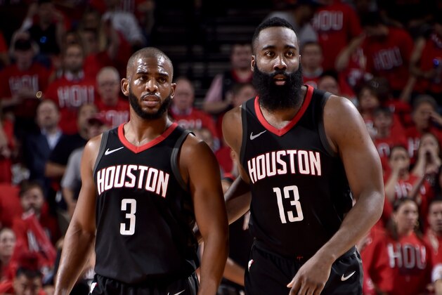 HOUSTON, TX - MAY 14:  Chris Paul #3 and James Harden #13 of the Houston Rockets during the game against the Golden State Warriors in Game One of the Western Conference Finals of the 2018 NBA Playoffs on May 14, 2018 at the Toyota Center in Houston, Texas. NOTE TO USER: User expressly acknowledges and agrees that, by downloading and or using this photograph, User is consenting to the terms and conditions of the Getty Images License Agreement. Mandatory Copyright Notice: Copyright 2018 NBAE (Photo by Bill Baptist/NBAE via Getty Images)