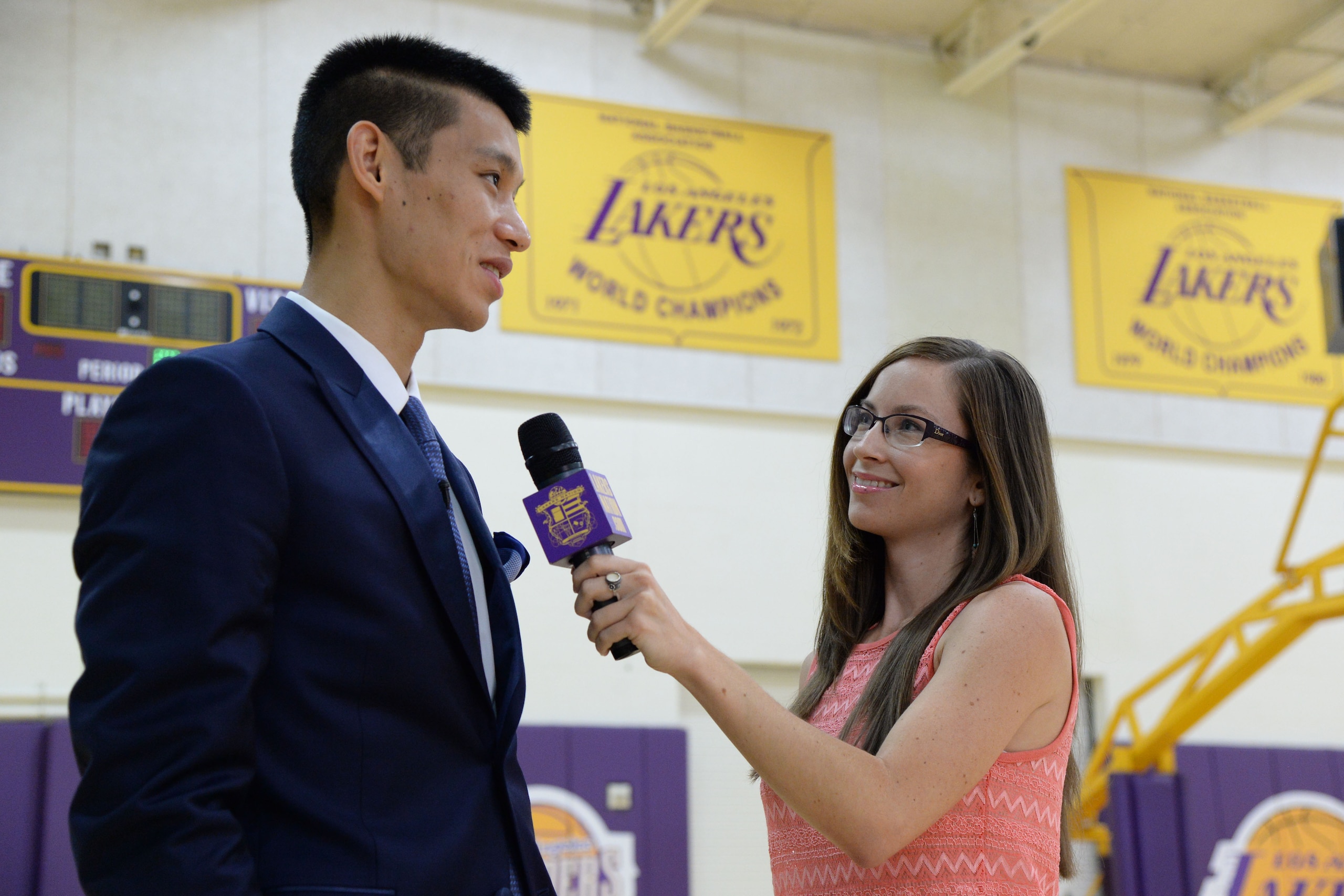 EL SEGUNDO, CA - JULY 24: Jeremy Lin #17 of the Los Angeles Lakers is interviewed by Serena Winters of Lakers Nation during a press conference on July 24, 2014 at the Toyota Sports Center in El Segundo, California. NOTE TO USER: User expressly acknowledges and agrees that, by downloading and/or using this photograph, user is consenting to the terms and conditions of the Getty Images License Agreement.  Mandatory Copyright Notice: Copyright 2014 NBAE (Photo by Andrew D. Bernstein/NBAE via Getty Images)