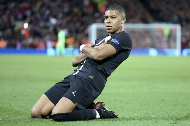 LIVERPOOL, ENGLAND - SEPTEMBER 18: Kylian Mbappe of PSG celebrates his goal during the Group C match of the UEFA Champions League between Liverpool FC and Paris Saint-Germain (PSG) at Anfield on September 18, 2018 in Liverpool, United Kingdom. (Photo by Jean Catuffe/Getty Images)