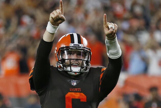 Cleveland Browns quarterback Baker Mayfield celebrates a 1-yard touchdown by running back Carlos Hyde during the second half of an NFL football game against the New York Jets, Thursday, Sept. 20, 2018, in Cleveland. (AP Photo/Ron Schwane)