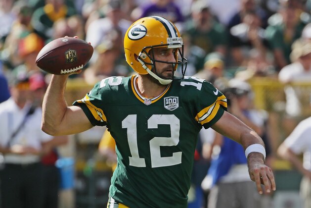 GREEN BAY, WI - SEPTEMBER 16:  Aaron Rodgers #12 of the Green Bay Packers passes against the Minnesota Vikings at Lambeau Field on September 16, 2018 in Green Bay, Wisconsin. The Vikings and the Packers tied 29-29 after overtime.  (Photo by Jonathan Daniel/Getty Images)
