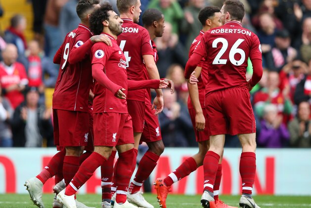 LIVERPOOL, ENGLAND - SEPTEMBER 22:  Mohamed Salah of Liverpool celebrates with teammates after scoring his team's third goal during the Premier League match between Liverpool FC and Southampton FC at Anfield on September 22, 2018 in Liverpool, United Kingdom.  (Photo by Alex Livesey/Getty Images)