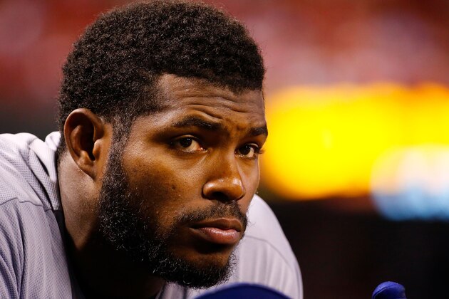 ST. LOUIS, MO - SEPTEMBER 14: Yasiel Puig #66 of the Los Angeles Dodgers waits in the hole during a game against the St. Louis Cardinals in the eighth inning at Busch Stadium on September 14, 2018 in St. Louis, Missouri.  (Photo by Dilip Vishwanat/Getty Images)