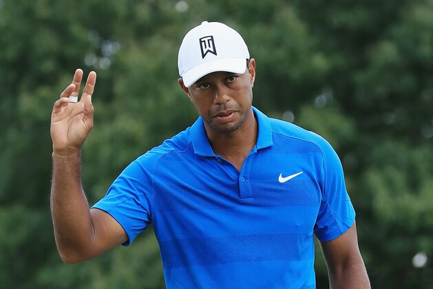 ATLANTA, GA - SEPTEMBER 22:  Tiger Woods of the United States acknowledges the crowd on the third green during the third round of the TOUR Championship at East Lake Golf Club on September 22, 2018 in Atlanta, Georgia.  (Photo by Sam Greenwood/Getty Images)