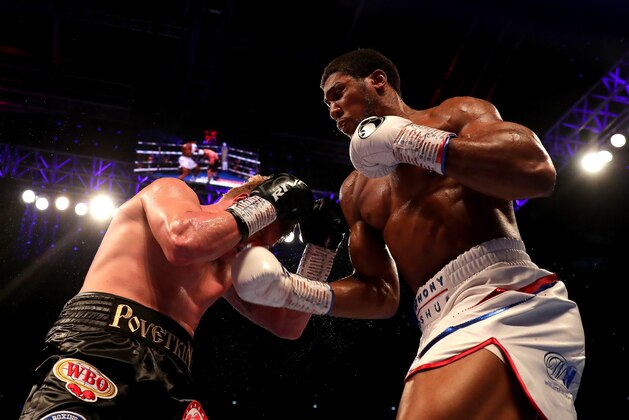 LONDON, ENGLAND - SEPTEMBER 22:  Anthony Joshua punches Alexander Povetkin during the IBF, WBA Super, WBO & IBO World Heavyweight Championship title fight between Anthony Joshua and Alexander Povetkin at Wembley Stadium on September 22, 2018 in London, England.  (Photo by Richard Heathcote/Getty Images)