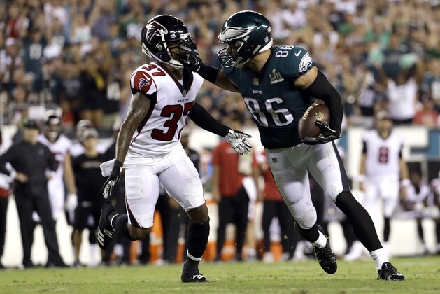 Philadelphia Eagles' Zach Ertz, right, pushes off from Atlanta Falcons' Ricardo Allen during the second half of an NFL football game Thursday, Sept. 6, 2018, in Philadelphia. (AP Photo/Michael Perez)