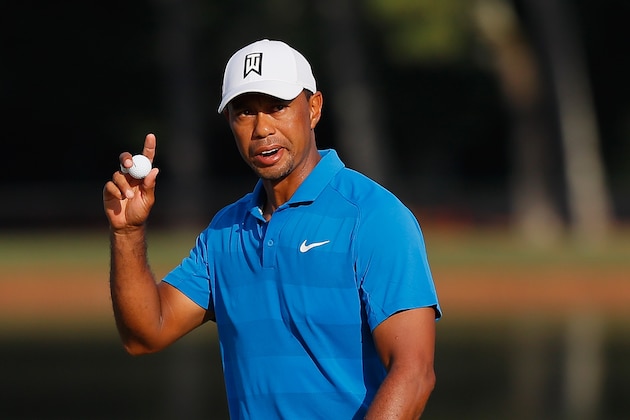ATLANTA, GA - SEPTEMBER 22:  Tiger Woods of the United States acknowledges the crowd on the 15th green during the third round of the TOUR Championship at East Lake Golf Club on September 22, 2018 in Atlanta, Georgia.  (Photo by Kevin C. Cox/Getty Images)