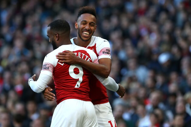 LONDON, ENGLAND - SEPTEMBER 23: Alexandre Lacazette and  Pierre-Emerick Aubameyang of Arsenal celebrat their teams first goal in action during the Premier League match between Arsenal and Everton at The Emirates Stadium on September 23, 2018 in London, England, United Kingdom. (Photo by Chloe Knott - Danehouse/Getty Images)