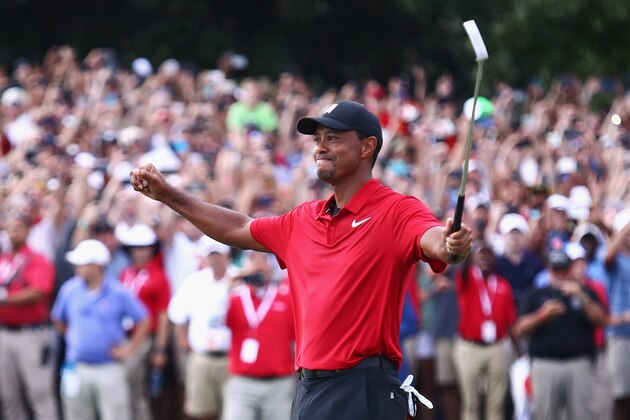 ATLANTA, GA - SEPTEMBER 23:  Tiger Woods of the United States celebrates making a par on the 18th green to win the TOUR Championship at East Lake Golf Club on September 23, 2018 in Atlanta, Georgia.  (Photo by Tim Bradbury/Getty Images)