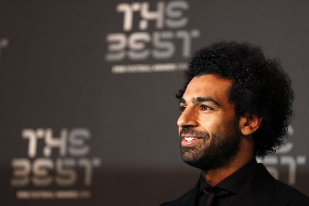 Liverpool and Egypt forward Mohamed Salah poses for a photograph as he arrives for The Best FIFA Football Awards ceremony, on September 24, 2018 in London. (Photo by Adrian DENNIS / AFP)        (Photo credit should read ADRIAN DENNIS/AFP/Getty Images)