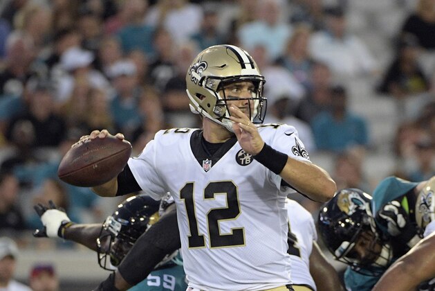 New Orleans Saints quarterback Tom Savage (12) throws a pass against the Jacksonville Jaguars during the first half of an NFL preseason football game, Thursday, Aug. 9, 2018, in Jacksonville, Fla. (AP Photo/Phelan M. Ebenhack)