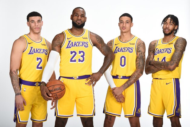 EL SEGUNDO, CA - SEPTEMBER 24: Lonzo Ball #2 LeBron James #23 Kyle Kuzma #0 and Brandon Ingram #14 of the Los Angeles Lakers pose for a portrait during media day at UCLA Health Training Center on September 24, 2018 in El Segundo, California. NOTE TO USER: User expressly acknowledges and agrees that, by downloading and/or using this Photograph, user is consenting to the terms and conditions of the Getty Images License Agreement. Mandatory Copyright Notice: Copyright 2018 NBAE (Photo by Andrew D. Bernstein/NBAE via Getty Images)