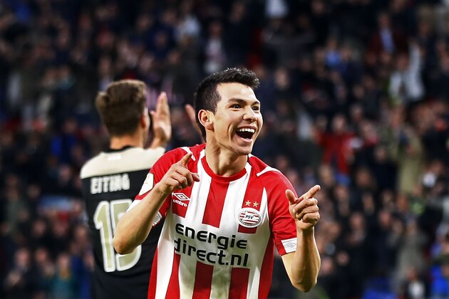 (L-R) Carel Eiting of Ajax, Hirving Lozano celebrating 3-0 during the Dutch Eredivisie match between PSV Eindhoven and Ajax Amsterdam at the Phillips stadium on September 22, 2018 in Eindhoven, The Netherlands(Photo by VI Images via Getty Images)
