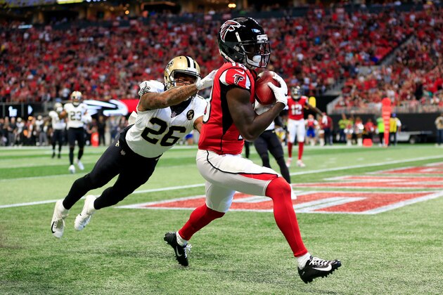 ATLANTA, GA - SEPTEMBER 23: Calvin Ridley #18 of the Atlanta Falcons catches a touchdown pass over P.J. Williams #26 of the New Orleans Saints during the first half at Mercedes-Benz Stadium on September 23, 2018 in Atlanta, Georgia. (Photo by Daniel Shirey/Getty Images)