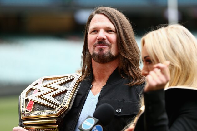 MELBOURNE, AUSTRALIA - JUNE 24: WWE'S world champion AJ Styles and Smackdown women's champion Carmella speak at the Melbourne Cricket Ground on June 24, 2018 in Melbourne, Australia. (Photo by Robert Prezioso/Getty Images)