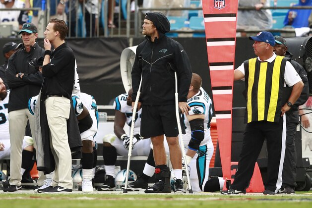 Carolina Panthers' Greg Olsen (88) watches from the sidelines after being injured during the second half of an NFL football game against the Dallas Cowboys in Charlotte, N.C., Sunday, Sept. 9, 2018. (AP Photo/Jason E. Miczek)