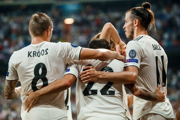 MADRID, SPAIN - SEPTEMBER 19: Isco Alarcon of Real Madrid celebrates after scoring his team`s first goal with Toni Kroos of Real Madrid and Gareth Bale of Real Madrid during the UEFA Champions League Group G match between Real Madrid and AS Roma at Bernabeu on September 19, 2018 in Madrid, Spain. (Photo by TF-Images/Getty Images)