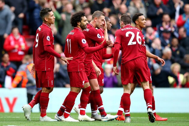 LIVERPOOL, ENGLAND - SEPTEMBER 22:  Mohamed Salah of Liverpool celebrates with teammates after scoring his team's third goal during the Premier League match between Liverpool FC and Southampton FC at Anfield on September 22, 2018 in Liverpool, United Kingdom.  (Photo by Alex Livesey/Getty Images)