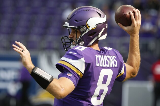 Minnesota Vikings quarterback Kirk Cousins warms up before an NFL football game against the Buffalo Bills, Sunday, Sept. 23, 2018, in Minneapolis. (AP Photo/Bruce Kluckhohn)