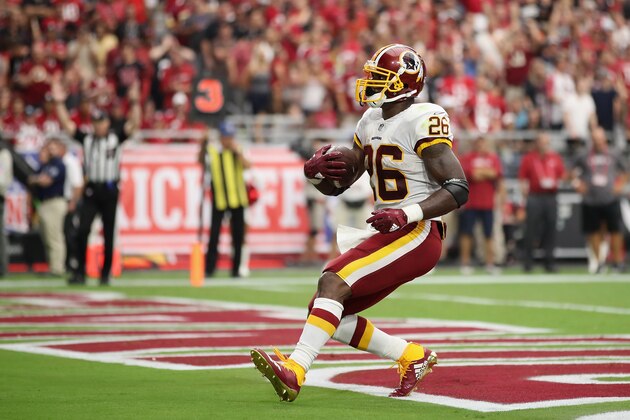 GLENDALE, AZ - SEPTEMBER 09:  Running back Adrian Peterson #26 of the Washington Redskins scores on a one yard rushing touchdown against the Arizona Cardinals during the NFL game at State Farm Stadium on September 9, 2018 in Glendale, Arizona.  (Photo by Christian Petersen/Getty Images)