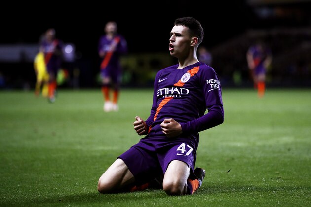 OXFORD, ENGLAND - SEPTEMBER 25:  Phil Foden of Manchester City celebrates after scoring his team's third goal during the Carabao Cup Third Round match between Oxford United and Manchester City at Kassam Stadium on September 25, 2018 in Oxford, England.  (Photo by Julian Finney/Getty Images)