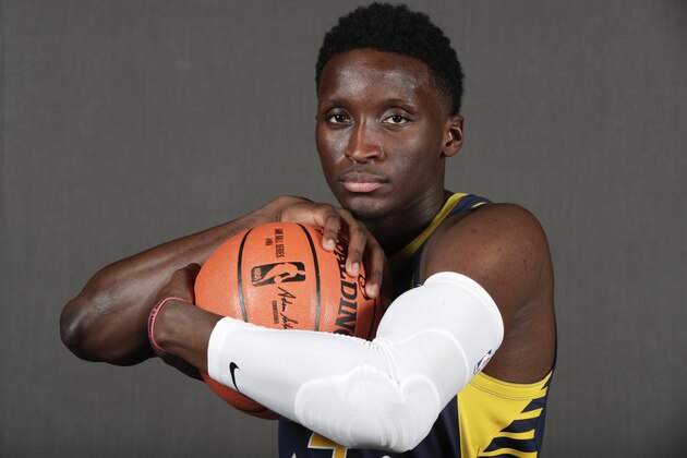 Indiana Pacers guard Victor Oladipo (4) poses for a photograph during the NBA basketball team's media day in Indianapolis, Monday, Sept. 24, 2018. (AP Photo/Michael Conroy)
