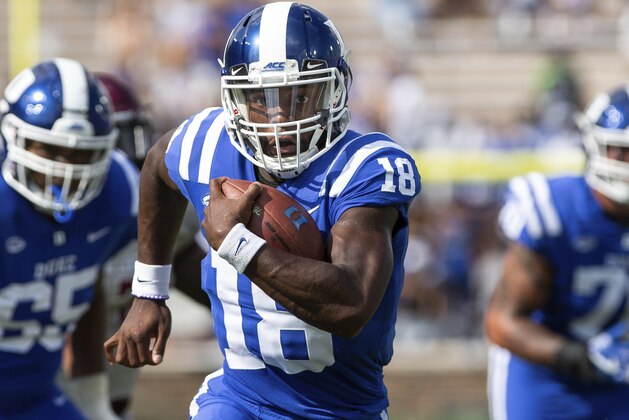 Duke quarterback Quentin Harris (18) carries the ball for a touchdown during the first half of an NCAA college football game against North Carolina Central in Durham, N.C., Saturday, Sept. 22, 2018. (AP Photo/Ben McKeown)